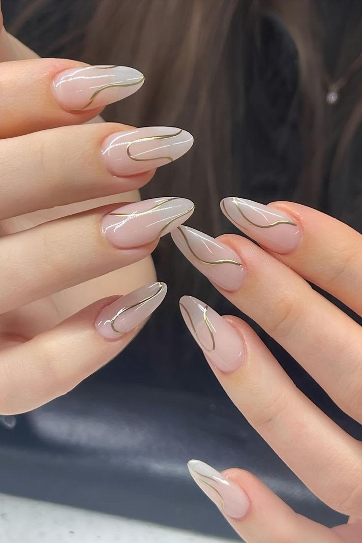 Gold chrome swirl design on odorless nail extensions chinook mall