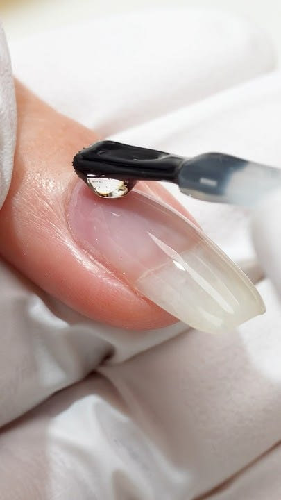Rebuilding the apex with fresh gel during bio gel refill calgary