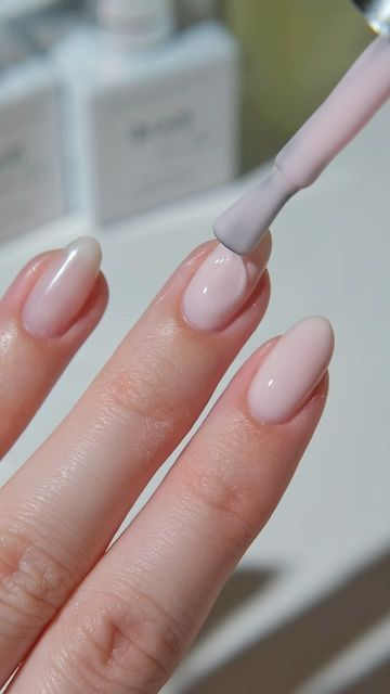 Applying fresh gel polish during bio gel refill calgary